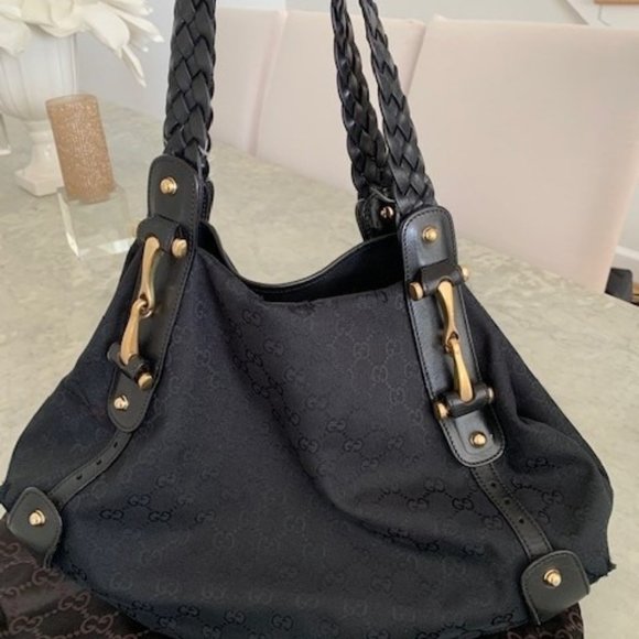 Gucci Handbags - Gucci- Canvas Vintage Hobo bag with braided leather handles